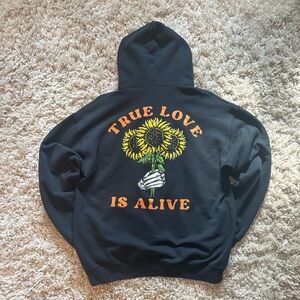 Black Hoodie with Sunflower Graphic